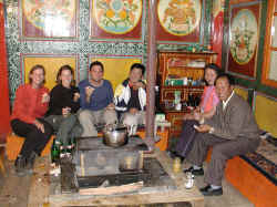 Living Buddha on the right, yak cheese in hand